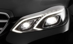 First vehicle with 100% LED low beam headlamps and optional camera based full-LED headlamp with glare-free high beam