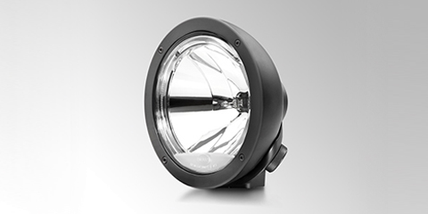 Resistente faro de largo alcance Luminator Compact Metal Celis en color negro, de HELLA