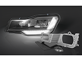 Compared to conventional headlamps, it should also be possible to replace and repair individual parts.