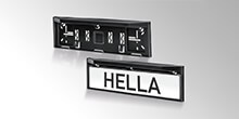 Licence plate bracket with integrated LED licence plate lamp 329 280